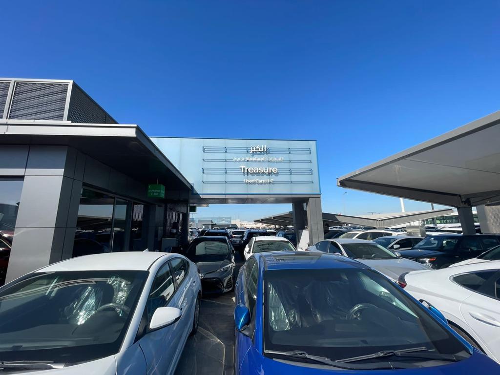 IN-OVATIVE AUTO WORKS vehicle yard and showroom